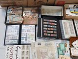 a table with a lot of stamps and stamps on it