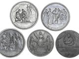 quatre types différents de pièces d'argent sont représentés sur un fond blanc