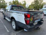 a pick up truck that is parked in a parking lot