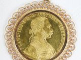 an image of a gold coin with a woman ' s face on it