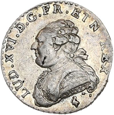 une pièce d'argent représentant une femme