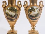une paire de vases anciens dorés, ornés d'un paysage peint