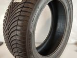 a close up of a tire on a white surface