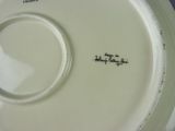 a close up of a plate with writing on it