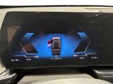a picture of a car ' s dashboard with a digital display