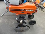 a small machine that is sitting on the ground