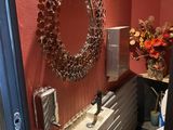 a bathroom with a sink and a mirror on the wall