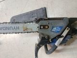 a chainsaw that is laying on the floor