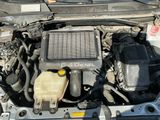 a car engine with its hood open and the hood open