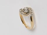 une bague en or et diamants