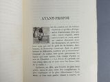 an open book with a picture of a cat on it