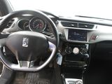 the interior of a car with a steering wheel and dashboard controls
