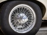a close up of a white car with a black rim