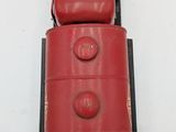 a red belt that is attached to a cell phone
