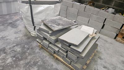 a pallet full of concrete blocks on a pallet