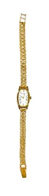 an image of a gold wrist watch with a white face