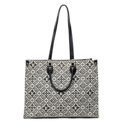 a black and white bag with a pattern on it