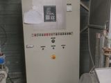a machine that is sitting inside of a building