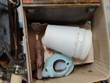 a box full of assorted items sitting on the floor