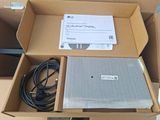a box with a laptop in it sitting on a table