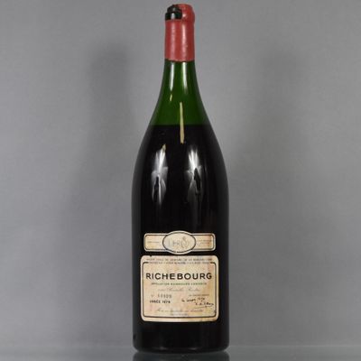 an image of a bottle of wine sitting on top of a table