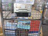 a metal cart with a bunch of books in it