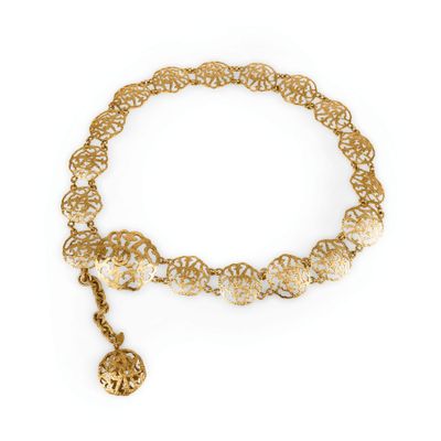 a gold bracelet with a heart charm on it