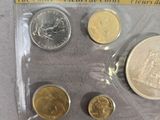 the coins are in a plastic bag on the table
