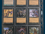 a lot of cards that are in a binder
