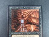 a close up of a card with a picture of a cave