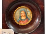 painting of a woman in a red dress in a wooden frame with a price tag
