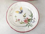 two plates that have different designs on them on the table