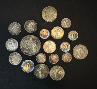 a lot of coins that are sitting on a table
