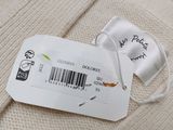 a label on a white sweater that says polo ralph ralph