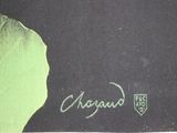 painting of a green leaf with a black background with the word organic