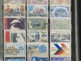 a picture of a display case with stamps on it
