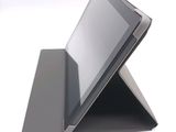 a tablet that is sitting on top of a stand