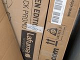 two cardboard boxes that are stacked on top of each other