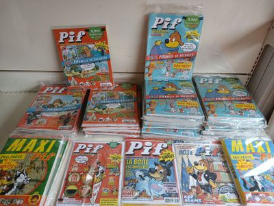 a lot of comic books on the table