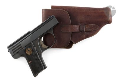 a close up of a gun and a holster on a white background