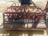 an image of a machine that is working on a field