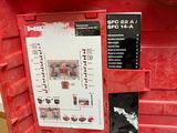 a red tool box with a list of items inside of it