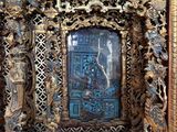 a picture of a wooden frame with a picture in it