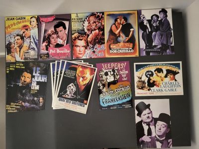 many movie posters on the wall of a refrigerator