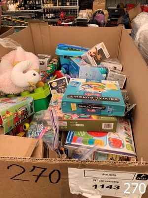 a cardboard box full of toys for sale in a store