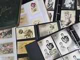 a lot of old black and white photos in a binder