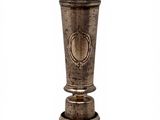 an antique silver vase on a white background with a white background