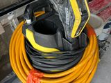 a yellow and black hose and a black and yellow hose