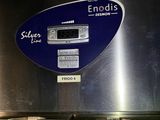 a blue and white sign on the side of a machine