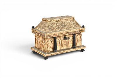 an image of a wooden box with carvings on it
